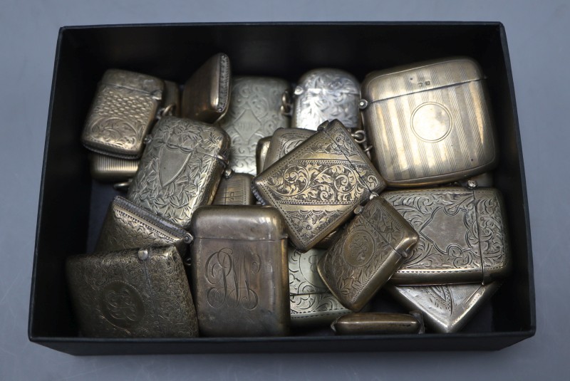 A collection of twenty three assorted Victorian and later silver(18) and plated(5) vesta cases, largest 57mm.